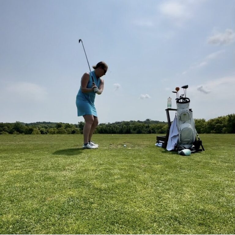 Miss Kira P practicing at driving range